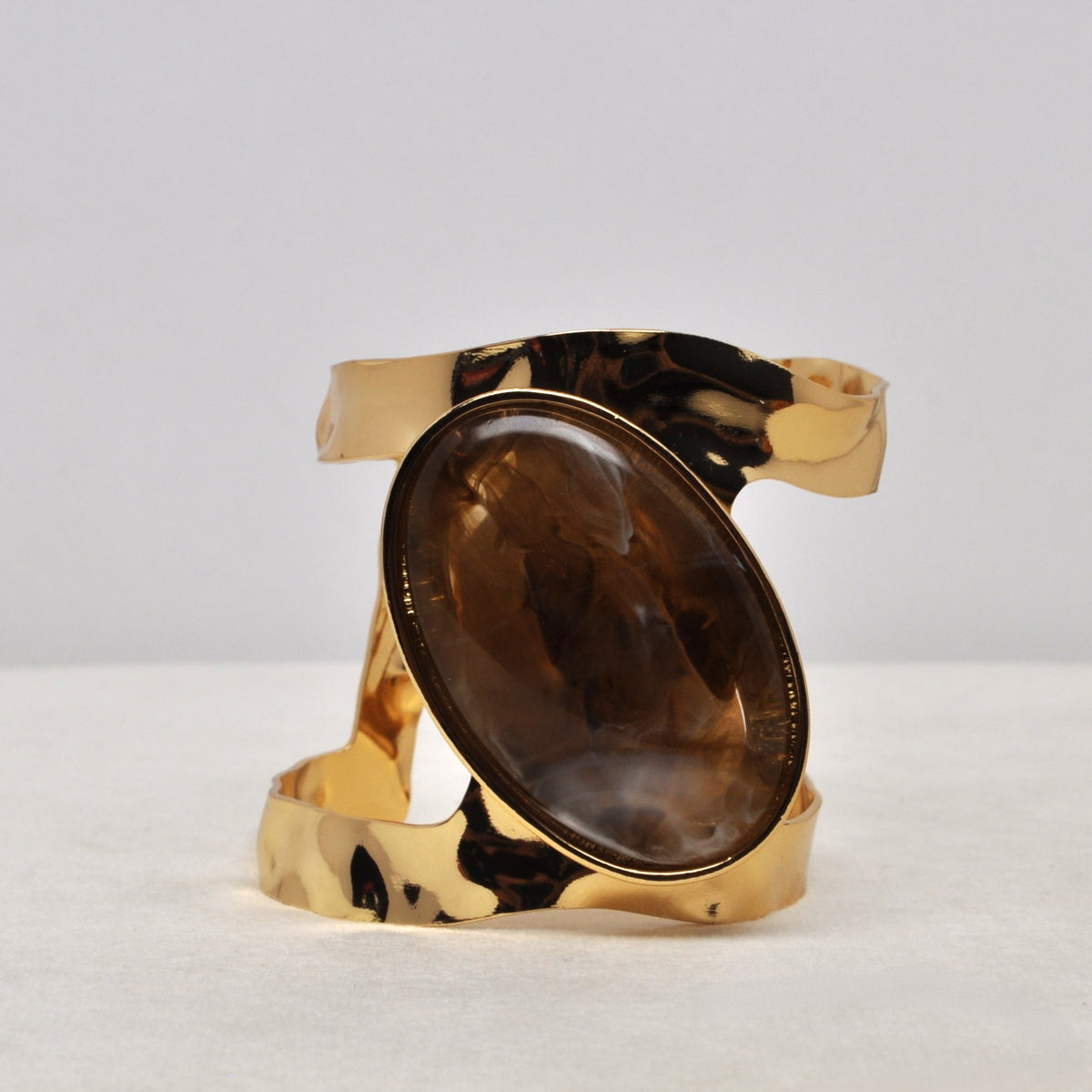 Polished Stone Piece w/Hammered Cuff