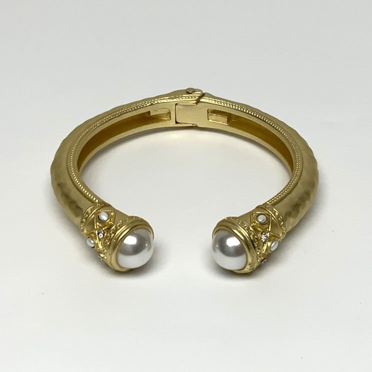 Gold cuff pearl designer bracelet