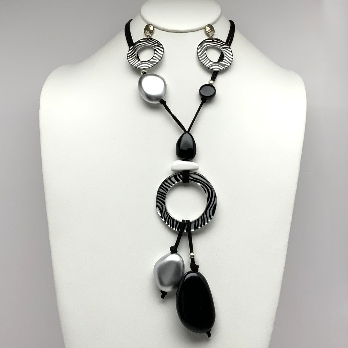 Long Suede Leather with Animal Print Circle and Tassel