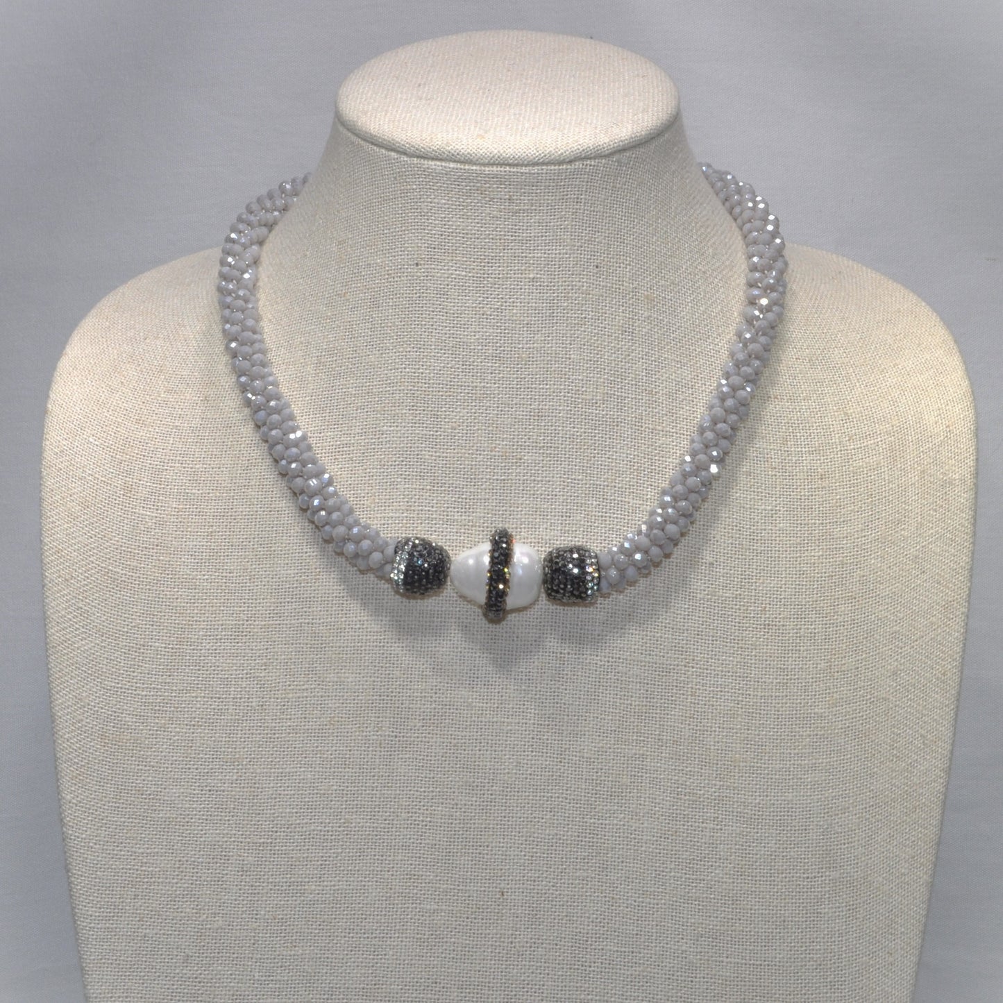 Magnetic Crystal Cluster with Oval Pearl