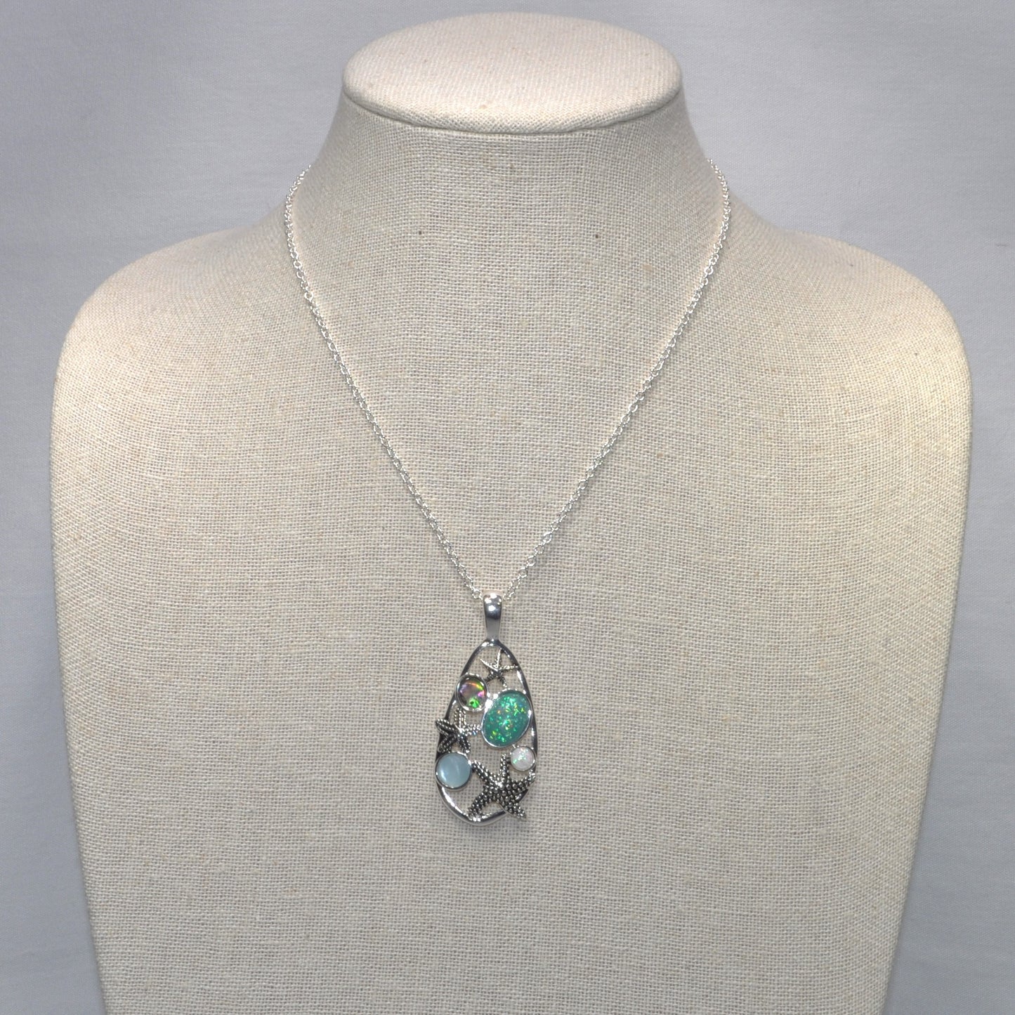 Abalone and Sea Glass with Three Starfish