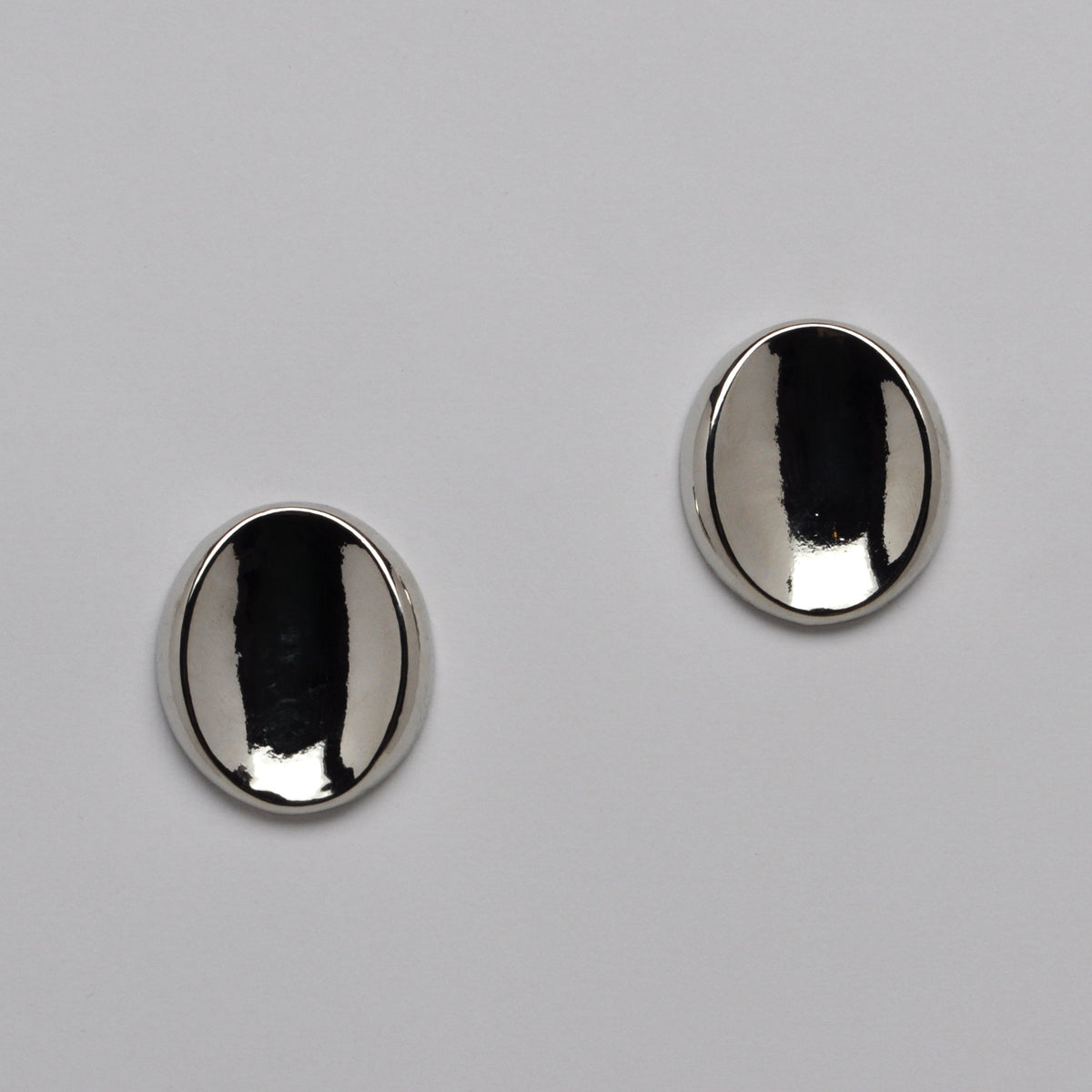 Sleek Oval Metallic Earrings