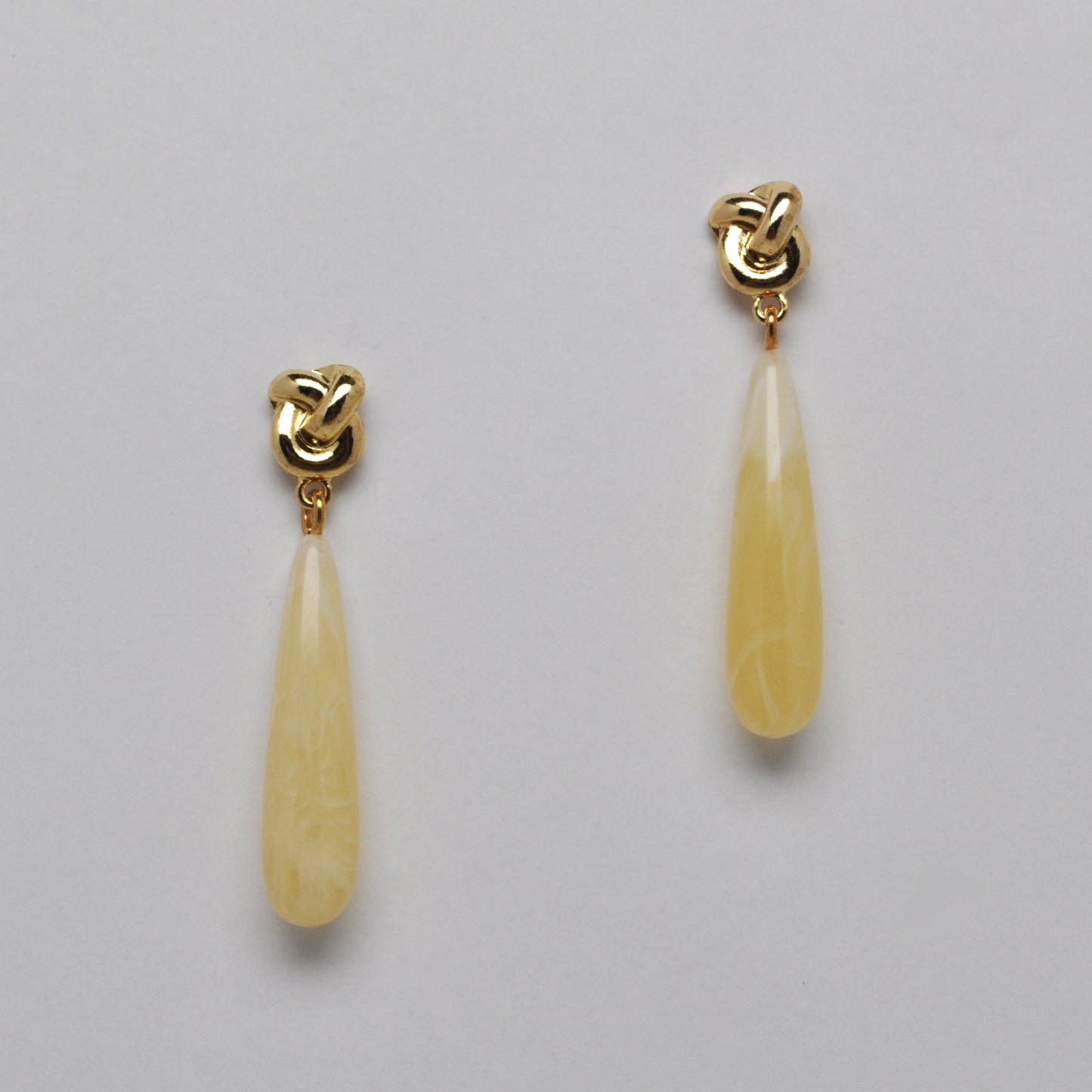 Metallic Love Knot and Marbled Resin Teardrop Earrings
