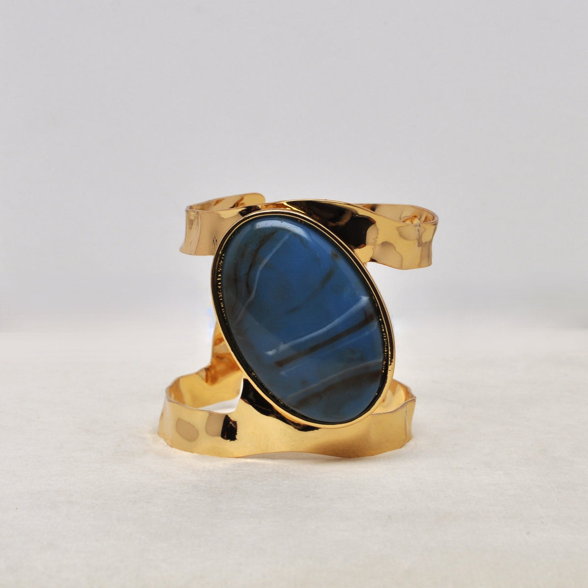 Polished Stone Piece w/Hammered Cuff