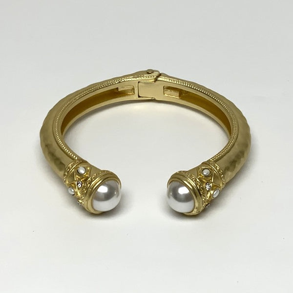 Gold cuff pearl designer bracelet