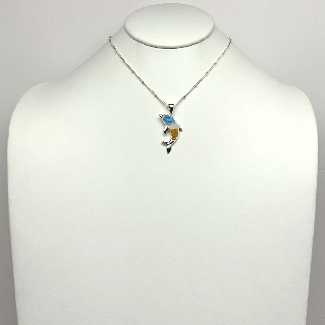 Rock Filled Dolphin Pendant Necklace